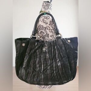 Prada Black Shoulder Bag with Vintage Scrollwork Leather Authetic.